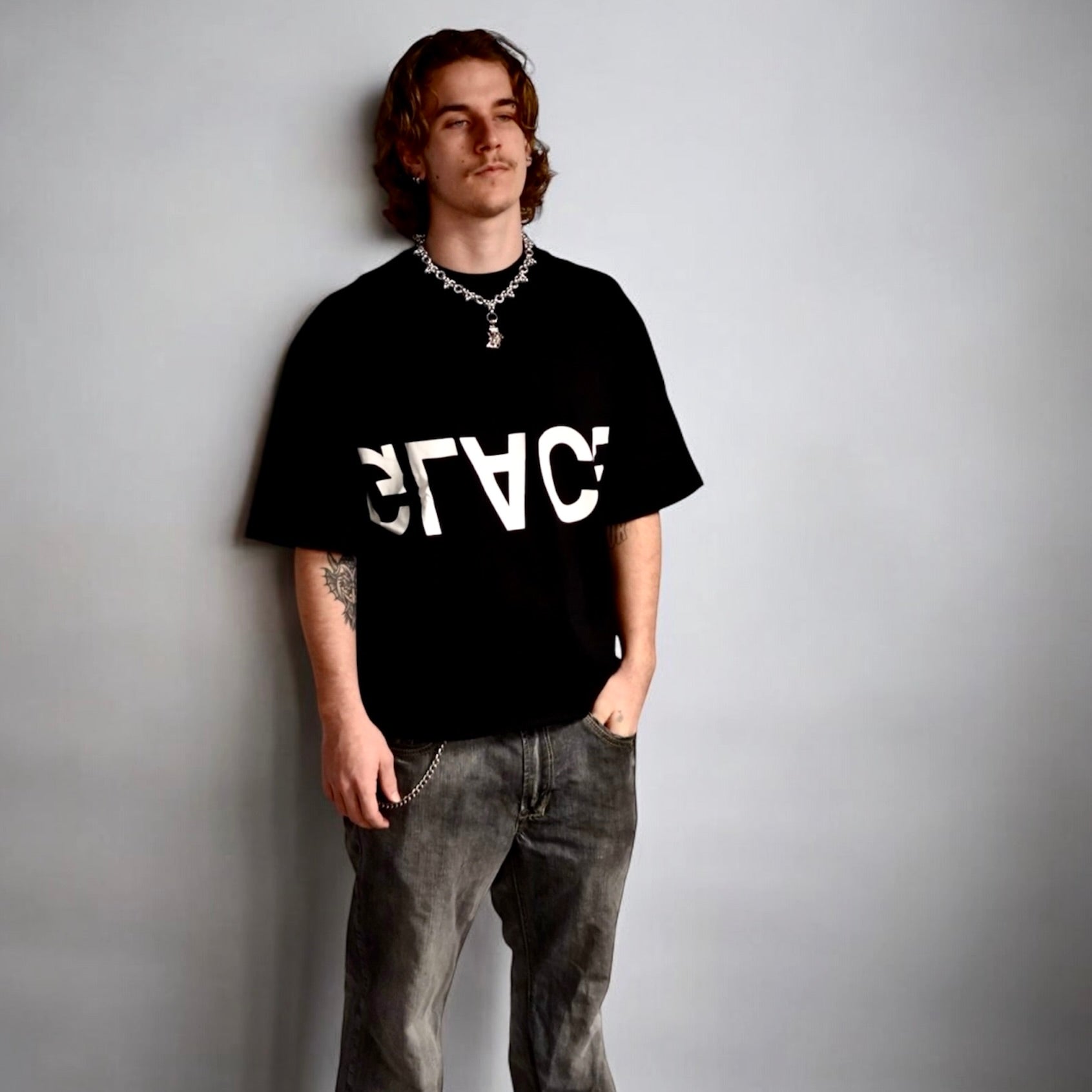 GENESIS — SIGNATURE TEE